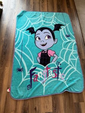 Vamperina “Fangtastic” Disney Teal Plush Towel with Purple Trim and Pink Tag